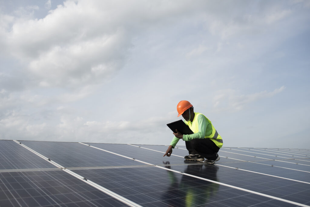 technician-engineer-checks-maintenance-solar-cell-panels-scaled